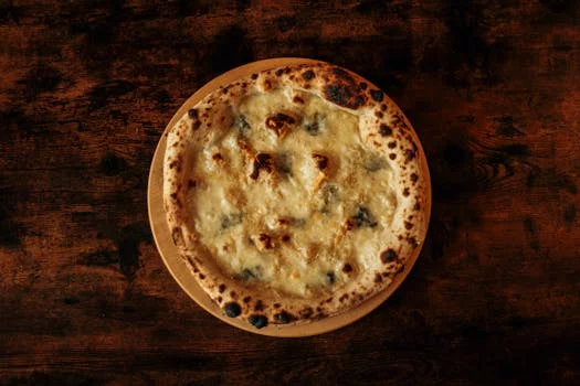 quattro formaggi pizza with four cheese types